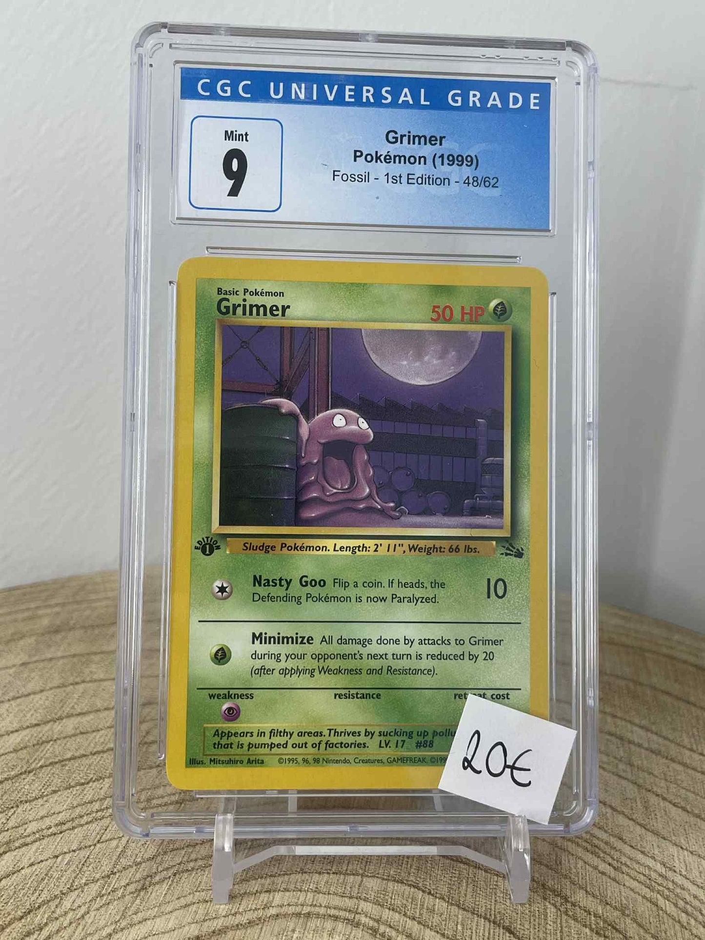 Grimer [1st Edition] #48 Pokemon Fossil CGC 9